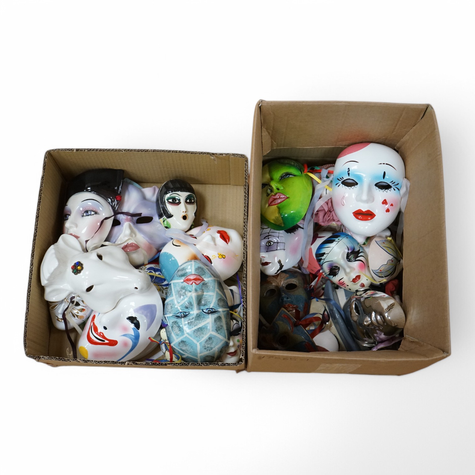 A large collection of various painted wall masks. Condition - varies
